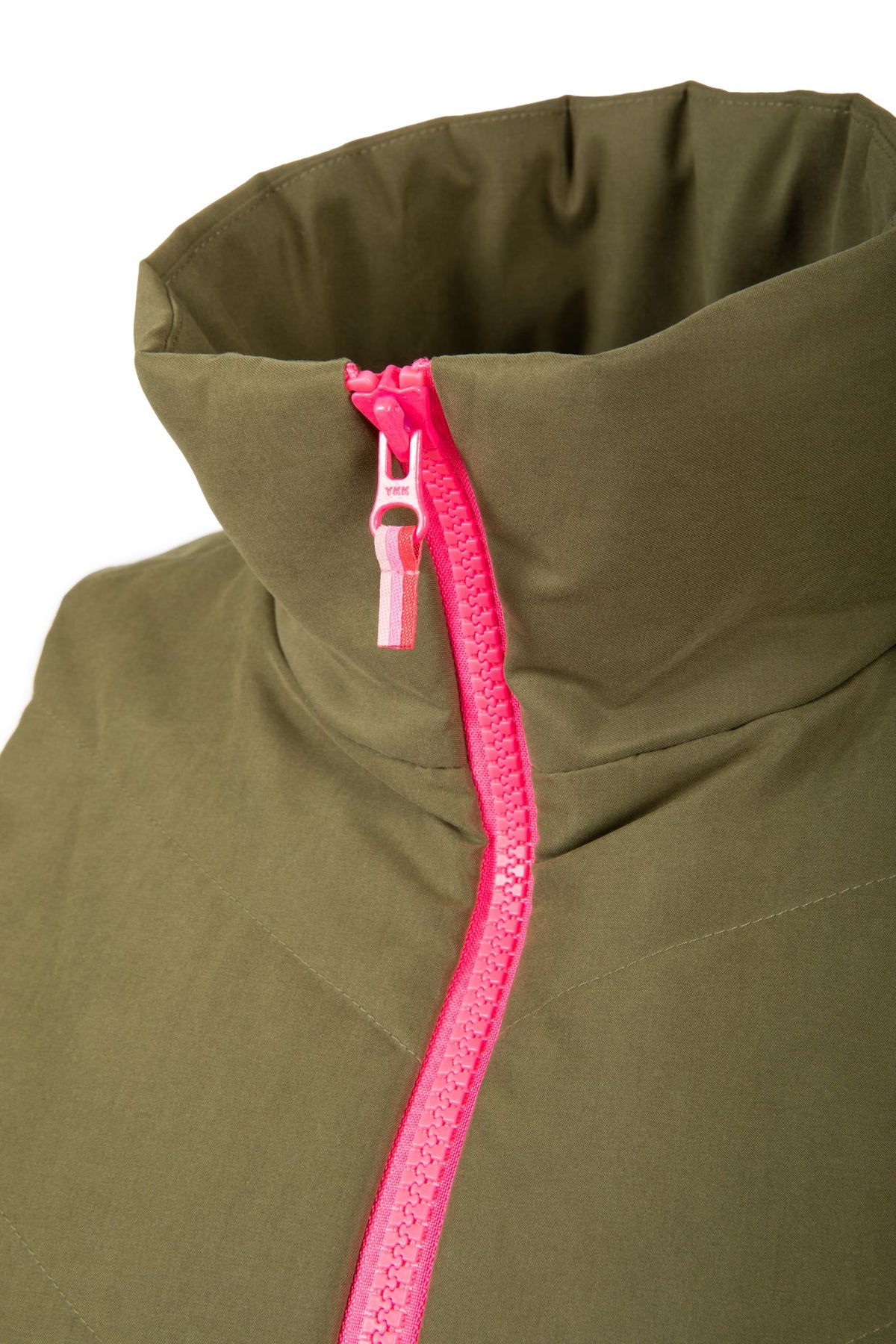 Close up of olive green twilight womens golf vest with pink zipper collar