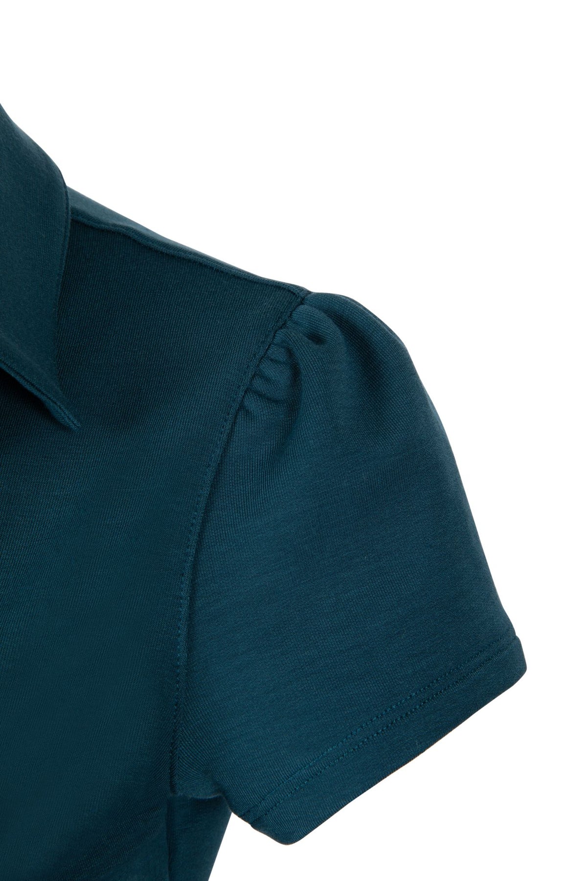Puff sleeve of June Daly women's golf polo.