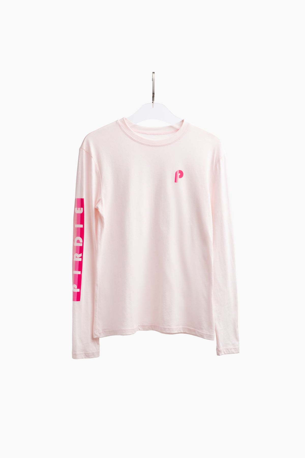 Pirdie's long sleeve golf t-shirt in dusty rose on hanger.