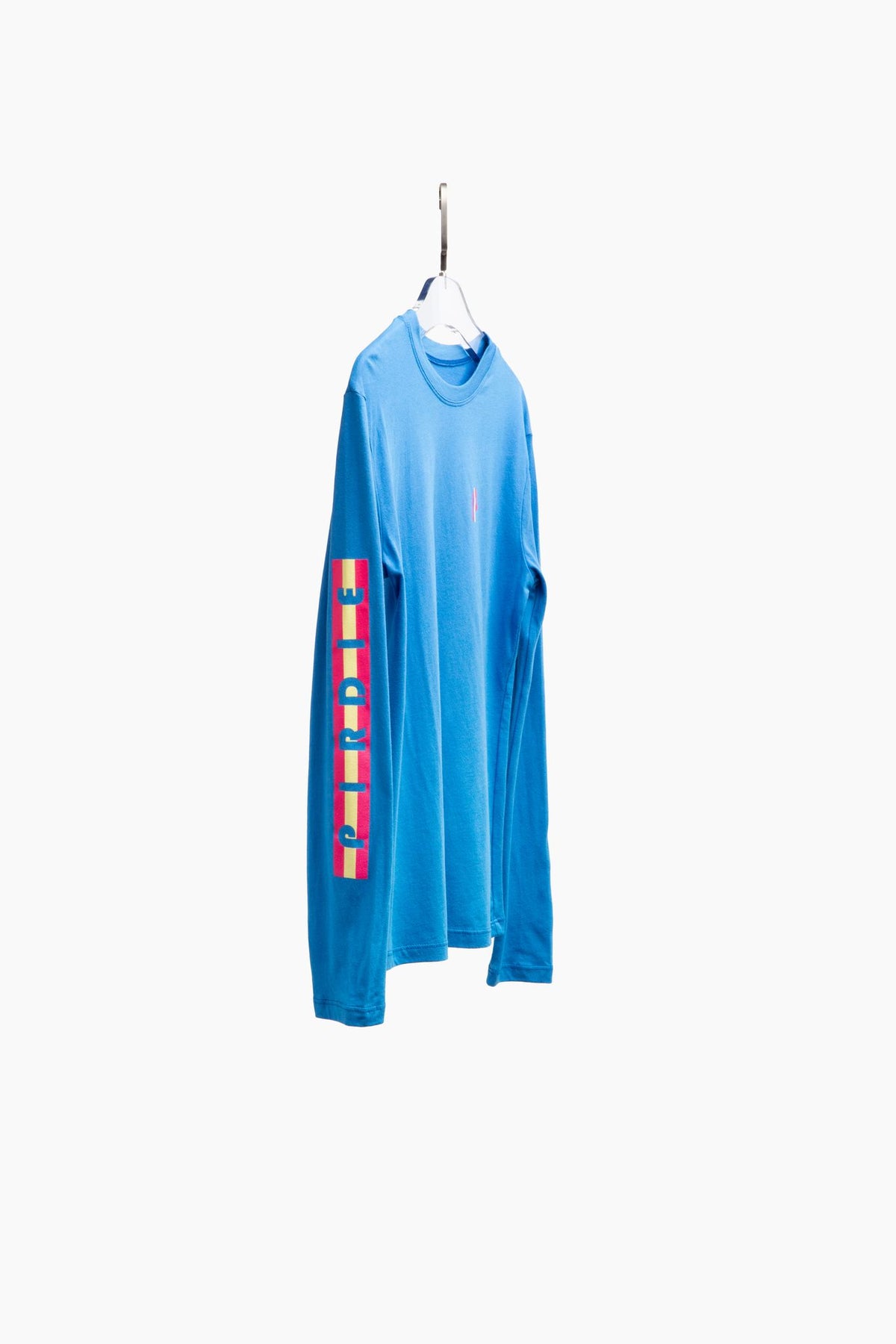 Pirdie's long sleeve golf t-shirt in blue on hanger.