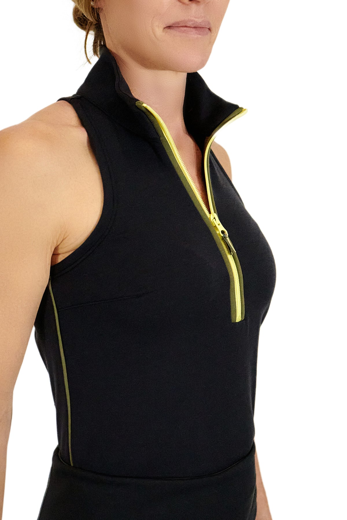 Model wearing Black Back Nine womens golf sleeveless shirt with yellow zipper