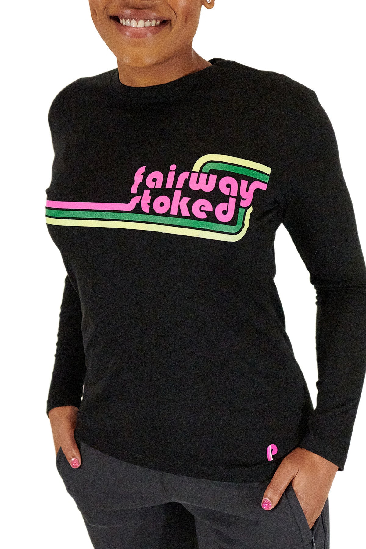 Model wearing a black long sleeve Fairway Stoked golf t-shirt.