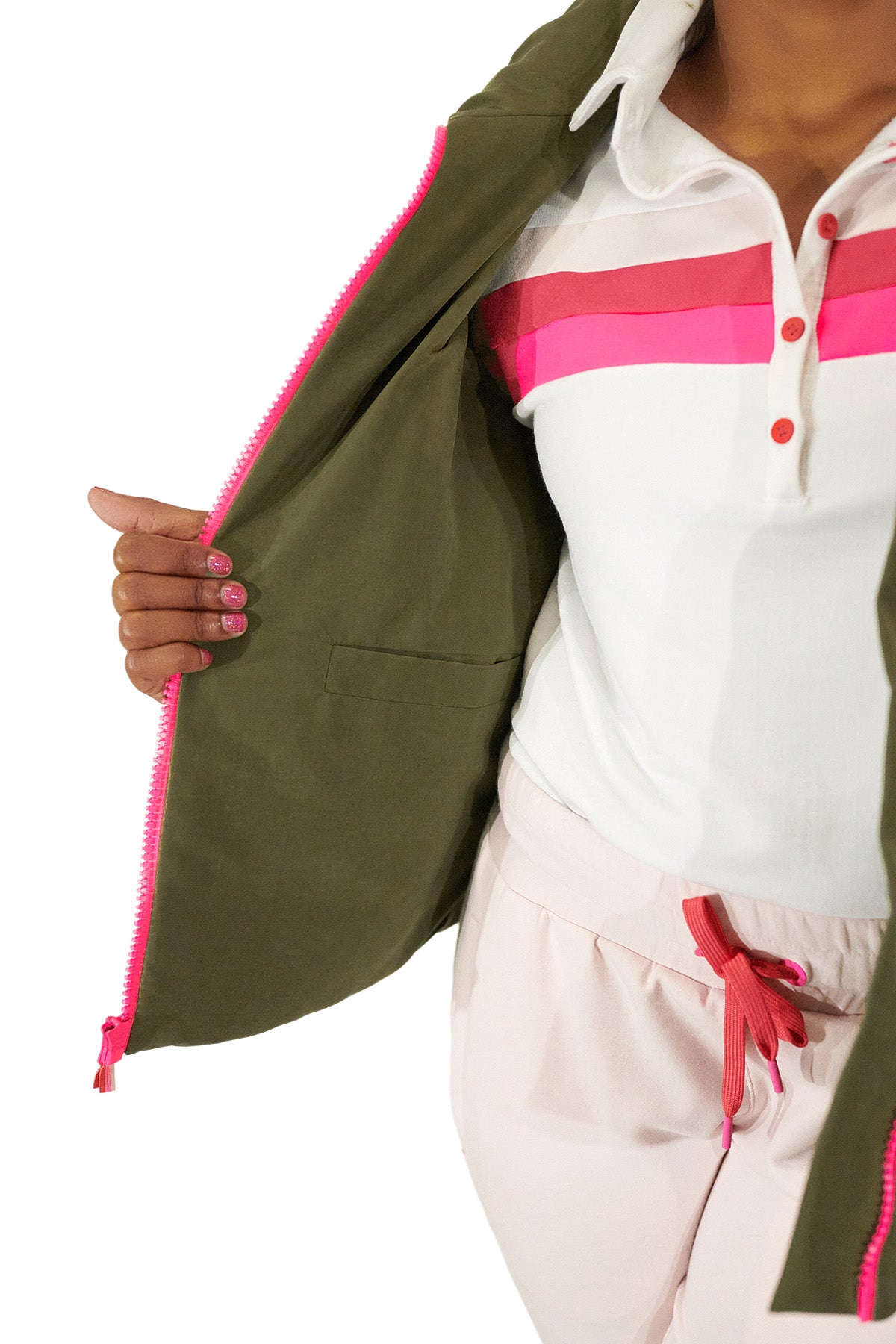 Model showing the inside of the Olive Green Twilight Women's golf Vest with Pink zipper